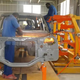 This shows the state of Kantanka’s factory, where we see a complicated stamping that I can not believe was produced in Ghana itself. I also can not explain why the worker is taking a grinder to the firewall. Photo via Africarm.org